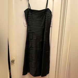Black satin pleated dress. New with tags